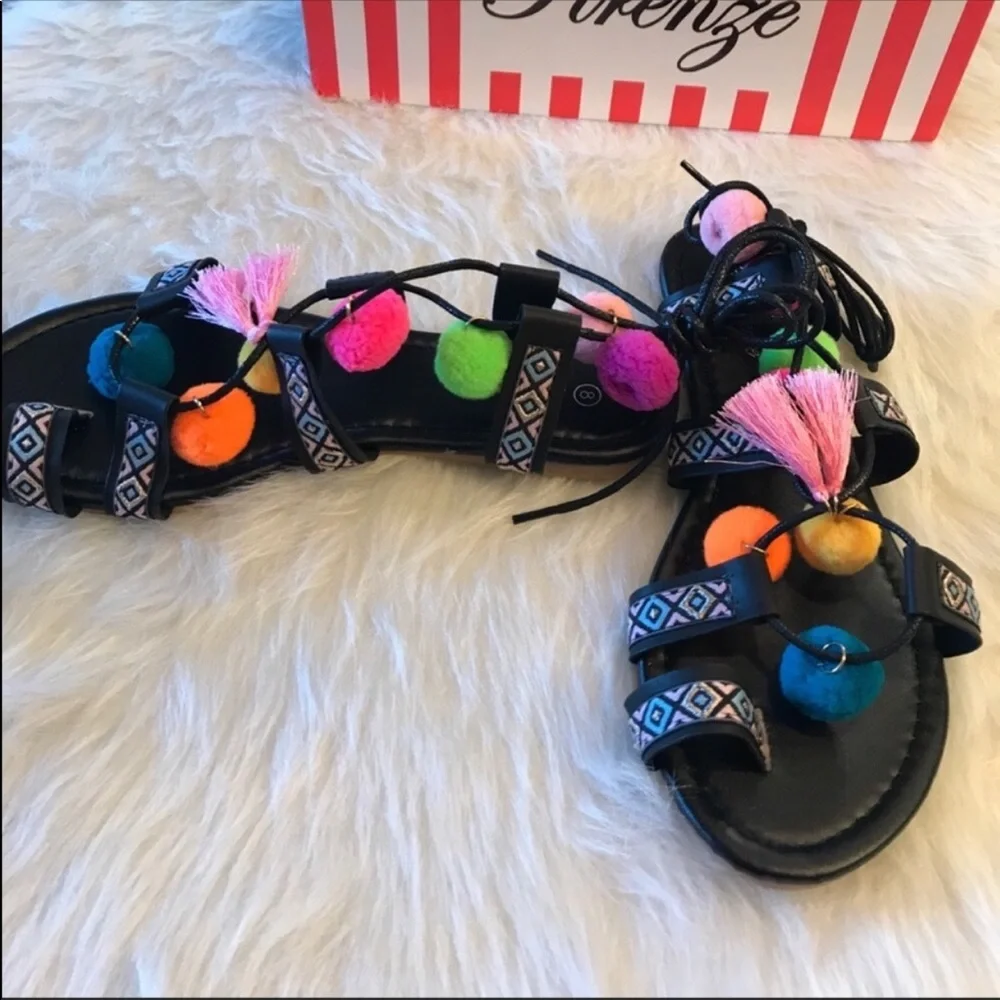 Firenze Pom Pom sandals.